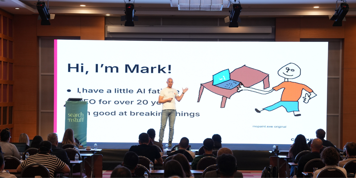 Mark Williams-Cook presenting “From RAG to Riches” on stage at SnS Antalya 2025 conference.